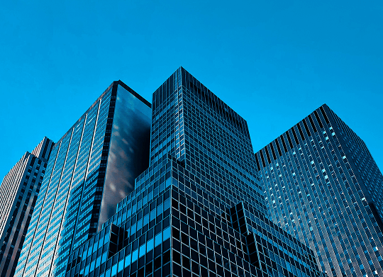 Modern skyscraper representing ARK Trinity's robust foundation