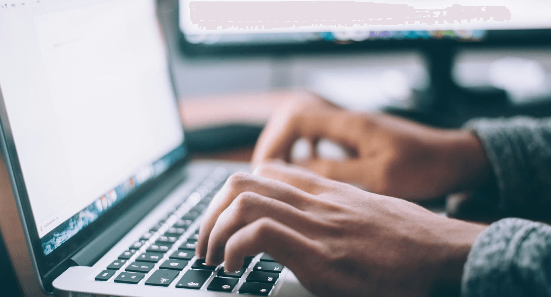 Digital Transformation - Hands typing on laptop